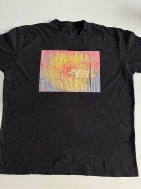 Black Short-Sleeve Graphic Tee with Sunset Animal Motif